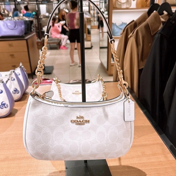 Coach Handbags - Coach Ivory Shoulder Bag with Gold Accents Fashion❤️🎉🎉🎉🎉